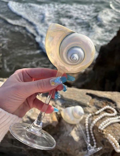 gentleescape's tweet photo. sea shell champagne cup https://t.co/ql4a3IuxgD