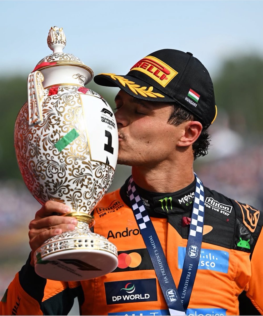 LN4CHAMP1ON's tweet photo. orange trophy for mclaren's 200th win vs golden trophy for lando's first win as a champion https://t.co/gf6cEUT2R3
