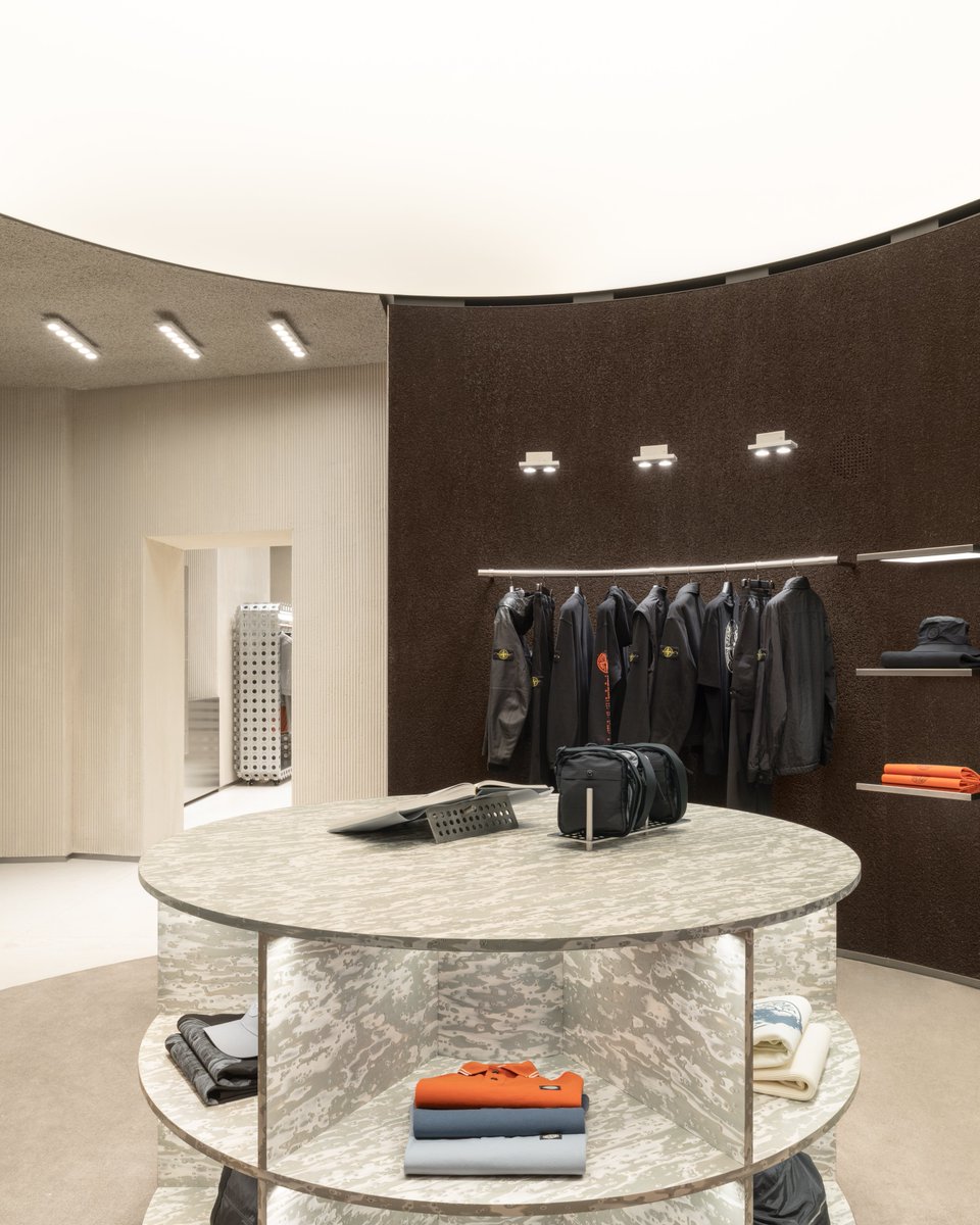 stoneisland's tweet photo. The Rome store has been conceived as a place where architecture, product and community converge. While preserving the character of the historic building, the store introduces a new spatial language that balances innovation with respect for the existing architecture. https://t.co/8SngtFWGbl