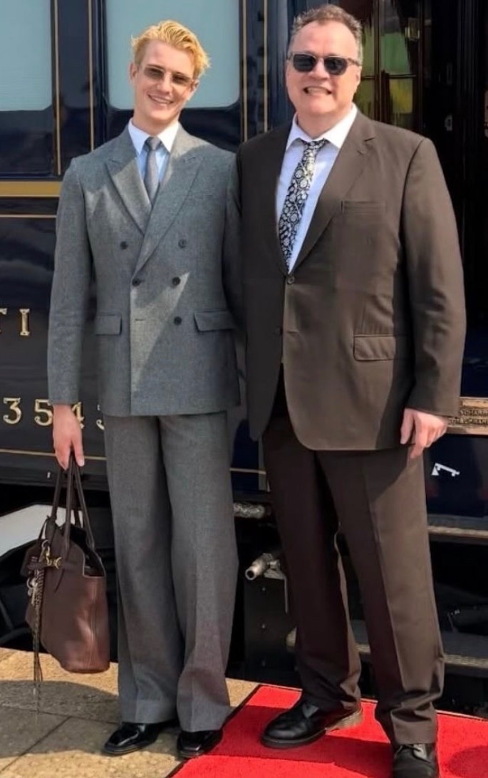 Sweetzy24's tweet photo. Russell T Davies and Oliver Cole celebrated their first anniversary, with plenty of wine. https://t.co/FLfy31ofUf