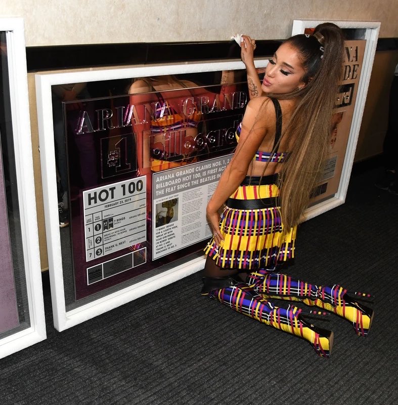 wfysaturnreturn's tweet photo. her getting these plaques both times while ON TOUR is making me emotional https://t.co/mlX4TSM0xM
