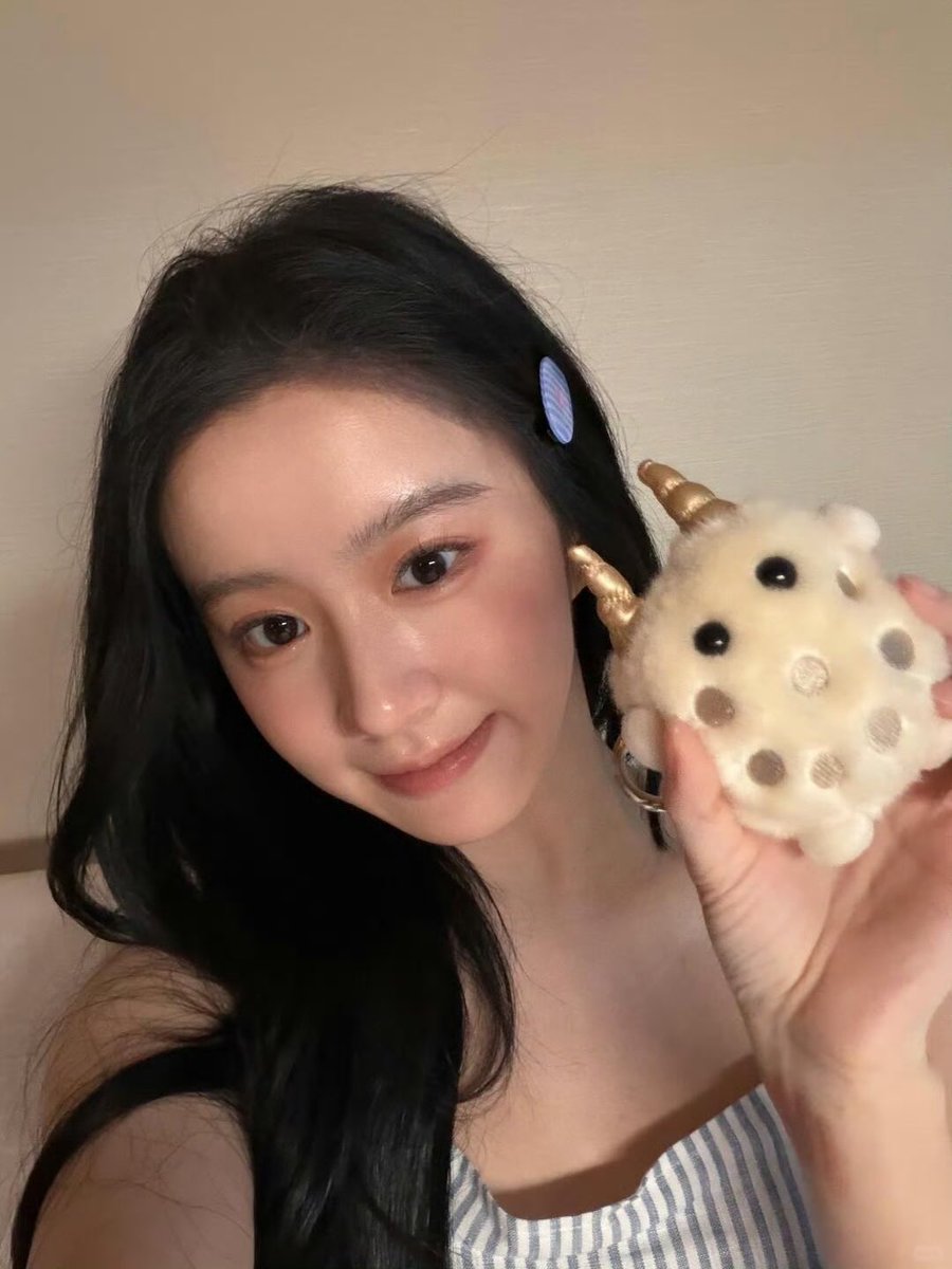 scangen's tweet photo. Just me and my tiny plush friend stealing a quiet moment together. That gentle smile, messy hair, and the warm feeling of something cute in my hands — pure happiness in its simplest form. https://t.co/UmY8lnwR5m