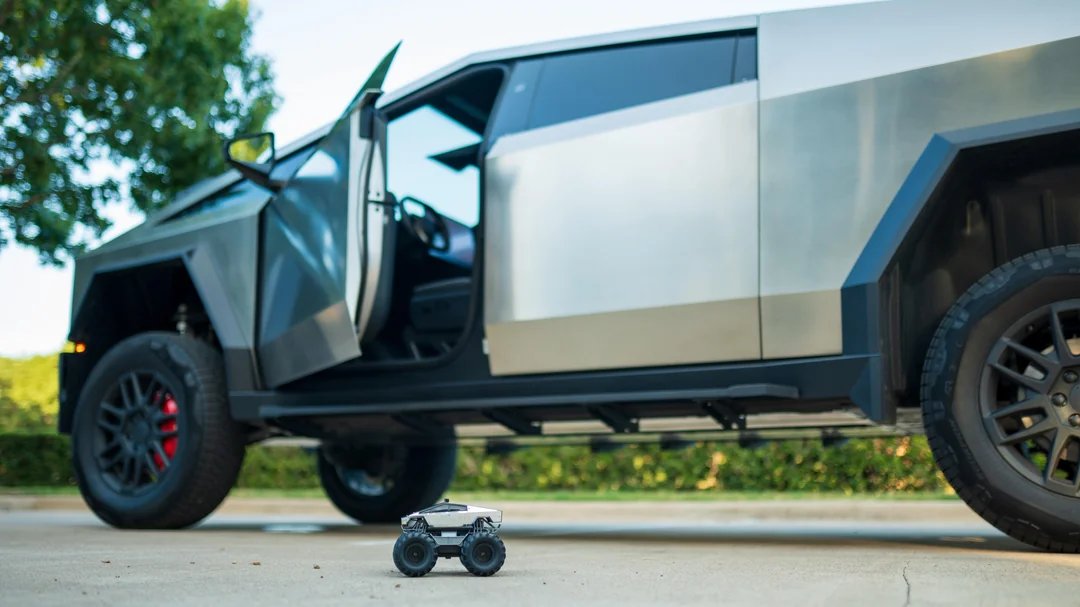 Joanfrankxxxxxx's tweet photo. The cutest height difference between a big vehicle and a small vehicle.#Cybertruck #Innovation #ElectricCars #TeslaAI https://t.co/dVsbiv8ONO