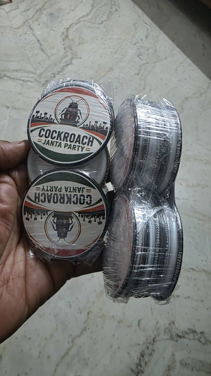 aruntl's tweet photo. Shocked to receive two courier packets carrying around 15 nos Cockroach Janta Party round badge pins. I never ordered them. Is this part of CJP toolkit ? Who has ordered this ? How did they know my name and address? How did CJP get the data ? I am throwing them, you know where.. https://t.co/BvA4rwae6e