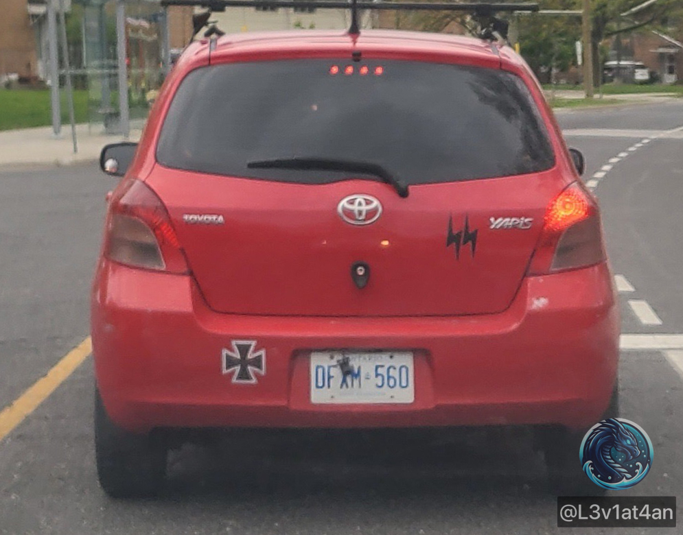 l3v1at4an's tweet photo. A Toyota Yaris with SS bolts &amp; the Iron Cross Nazi regalia was spotted driving along the Lawrence Heights Community Centre in Toronto.

This wasn't a Neo-Nazi white supremacist. This vehicle belongs to Turkish migrant Burak Emre Sahin.

@TorontoPolice @TPSOperations https://t.co/6BSPyqujBN