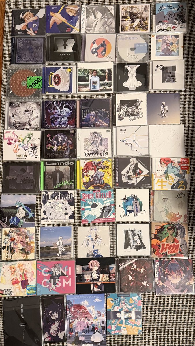 ventusism's tweet photo. i saw someone else do this on my timeline so i wanted to do it myself- my collection of vocaloid cds :’) https://t.co/ci695ZoTHy