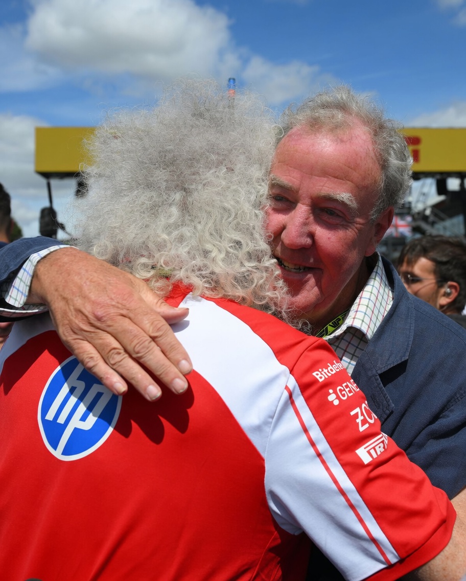 aqueenofmagic's tweet photo. Jeremy Clarkson embraces Sir Brian May during the Formula 1 Pirelli British Grand Prix 2026 at Silverstone Circuit, Towcester, on July 5, 2026. Photo by Jon Hobley.

#brianmay #queen #jeremyclarkson #f1 #silverstone https://t.co/RBuClFF3kK