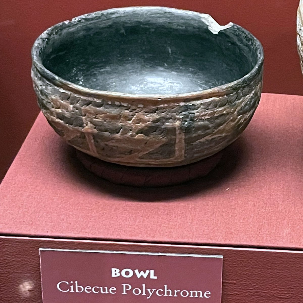 palatkwapi's tweet photo. Cibecue Polychrome is one of the rarest and most unusual pottery types from the ancient Southwest, and also one of the only painted corrugated types. This is an obliterated corrugated pot (usually a bowl) that is highly polished and smudged on the inside and painted with black/purple mineral paint with white outlines over a red slipped surface on the outside. It was made between about 1275 and 1350 by Mogollon potters in the mountains of central Arizona. Pots shown here come from Pueblo Treasures Museum, Pleasant Valley Museum and  S'edav Va'aki Museum.