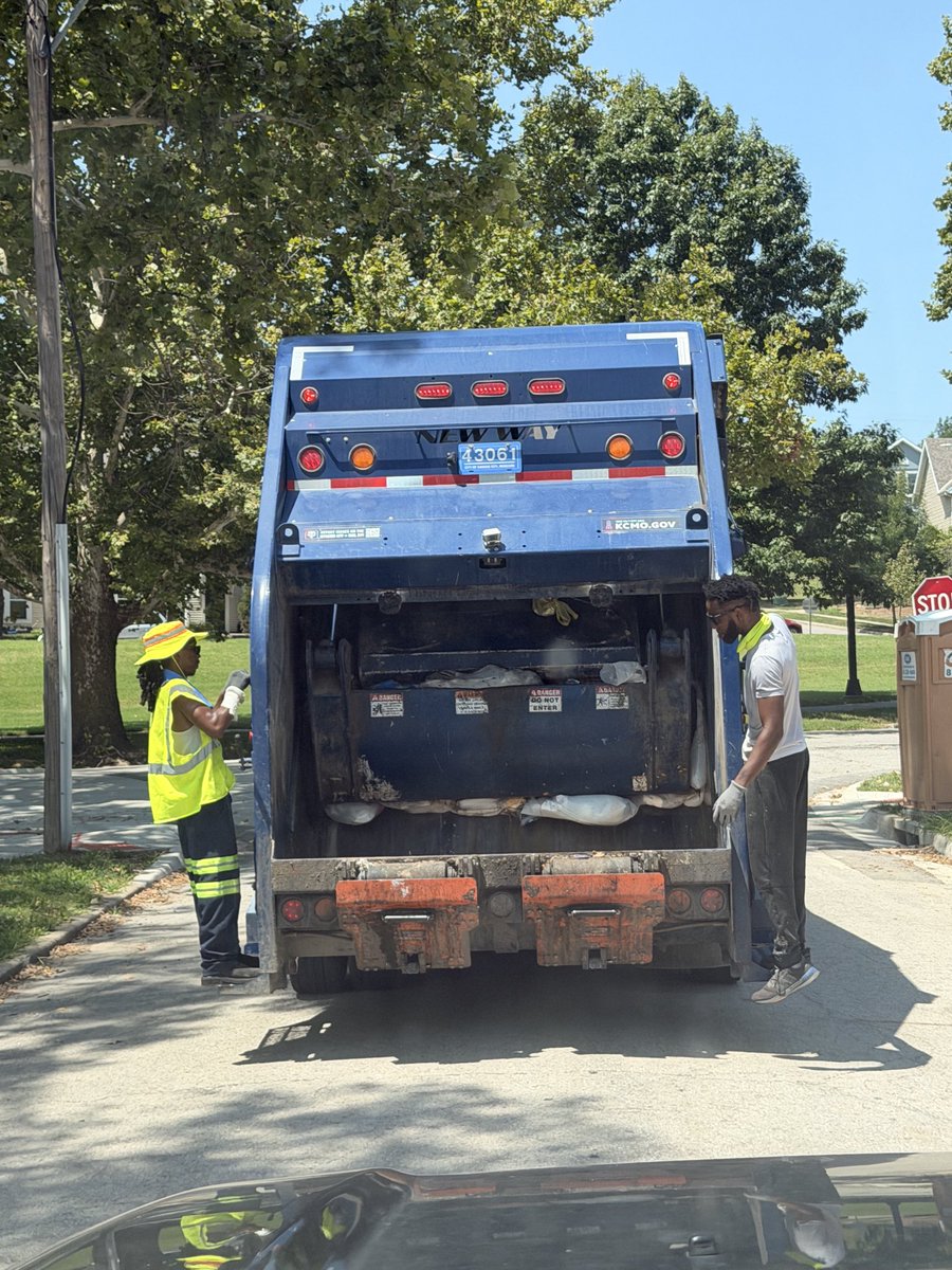 DePrisco's tweet photo. @KCMO311 @MayorLucasKC extra bag is tagged and got a violation, ask the garage crew what it was for, he denied that he put the violation on our trash can, and the guy in the white shirt told me to f*** off in front of my children.  Do better @KansasCity https://t.co/GoyZgtMuEu