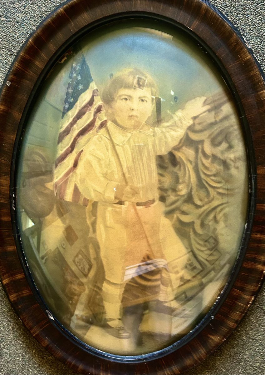 JBrittster's tweet photo. This is my late grandfather, Bernard Fink, as a child.  He escaped the holocaust and grew up on the lower east side of NY.  He loved America, his family, baseball and opera.  I am the third generation to proudly display this image of him as a child holding the American flag. 💕🇺🇸 https://t.co/lJhY0MiFG4