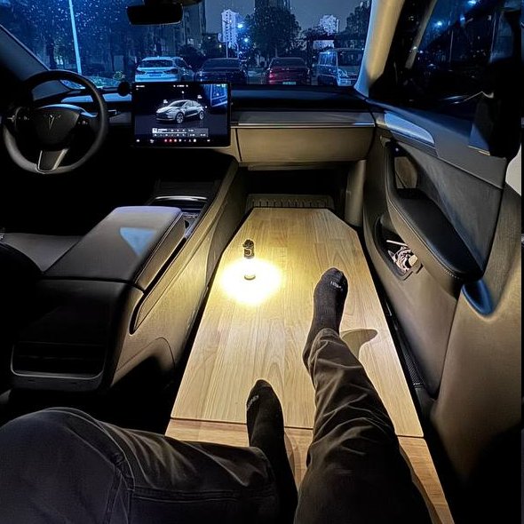 Anneonz1's tweet photo. Turning a Tesla Model Y into a mini camper by removing the passenger seat. Some builds even add a compact toilet setup. Who needs a traditional RV when your Tesla can become a road trip machine?

#Tesla #ModelY #TeslaLife #Camping #VanLife #EV #ElectricVehicles https://t.co/0vsyWaje1m