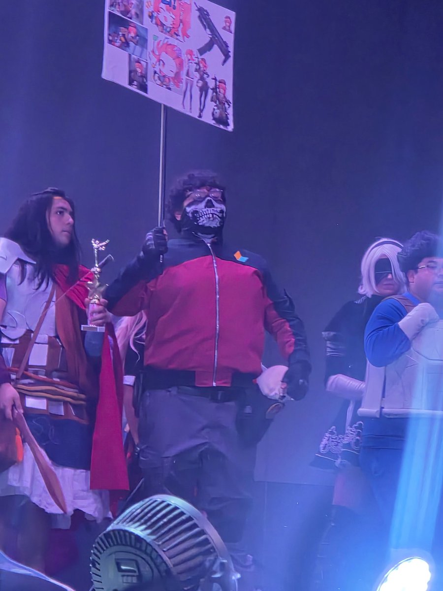 Gamer_Kun77's tweet photo. And that Commander, was me! May @StillHazoDDD rest in peace, because he truly deserves a proper honor, I am happy to have immortalized him at Anime Matsuri 2026

Hazo would have absolutely loved to see this, and I was extremely happy to do this!

#AnimeMatsuri #AnimeMatsuri2026 #GirlsFrontline2Exilium #GirlsFrontline2 #RIPHazo