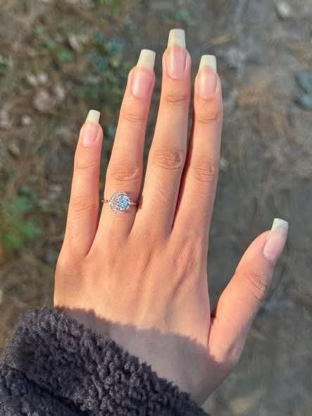farhatkhan990's tweet photo. He said I'm his sun, his moon, and his stars when he proposed last weekend and I said yes while my brain screamed that I don't like this ring.
I feel like a horrible person even typing that. He's perfect, the proposal was perfect, I love him completely. But this ring feels too special, too unique for someone like me who wears the same three plain shirts on rotation and panics when people look at me too long.
He got it from a talented jeweler he found through the Tedooo app, someone I'd actually been following for over a year without him knowing. Which should make it more meaningful but instead makes me feel worse because he clearly put so much thought into this.
It's beautiful. Everyone says it's stunning. My friends are posting my hand all over social media while I smile and pretend I'm not already thinking about how I'll explain wanting to exchange it. I don't like standing out and this ring demands attention everywhere I go.
Should I get used to it? Tell him the truth? I don't want to ruin his gesture but I also don't want to wear something that makes me uncomfortable for the rest of my life.