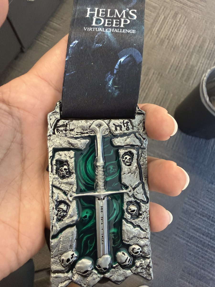EleazarTheWolf's tweet photo. “Look to my coming at first light on the fifth day. At dawn, look to the East.”

The white hand of Saruman sprawled over the Uruk-hai helm is absolutely gorgeous. Also, love the backdrop for Narsil. 

Another medal to add to the collection! I’ve ran 587 miles to get here!🏃‍♂️ https://t.co/twFPkdBO4S