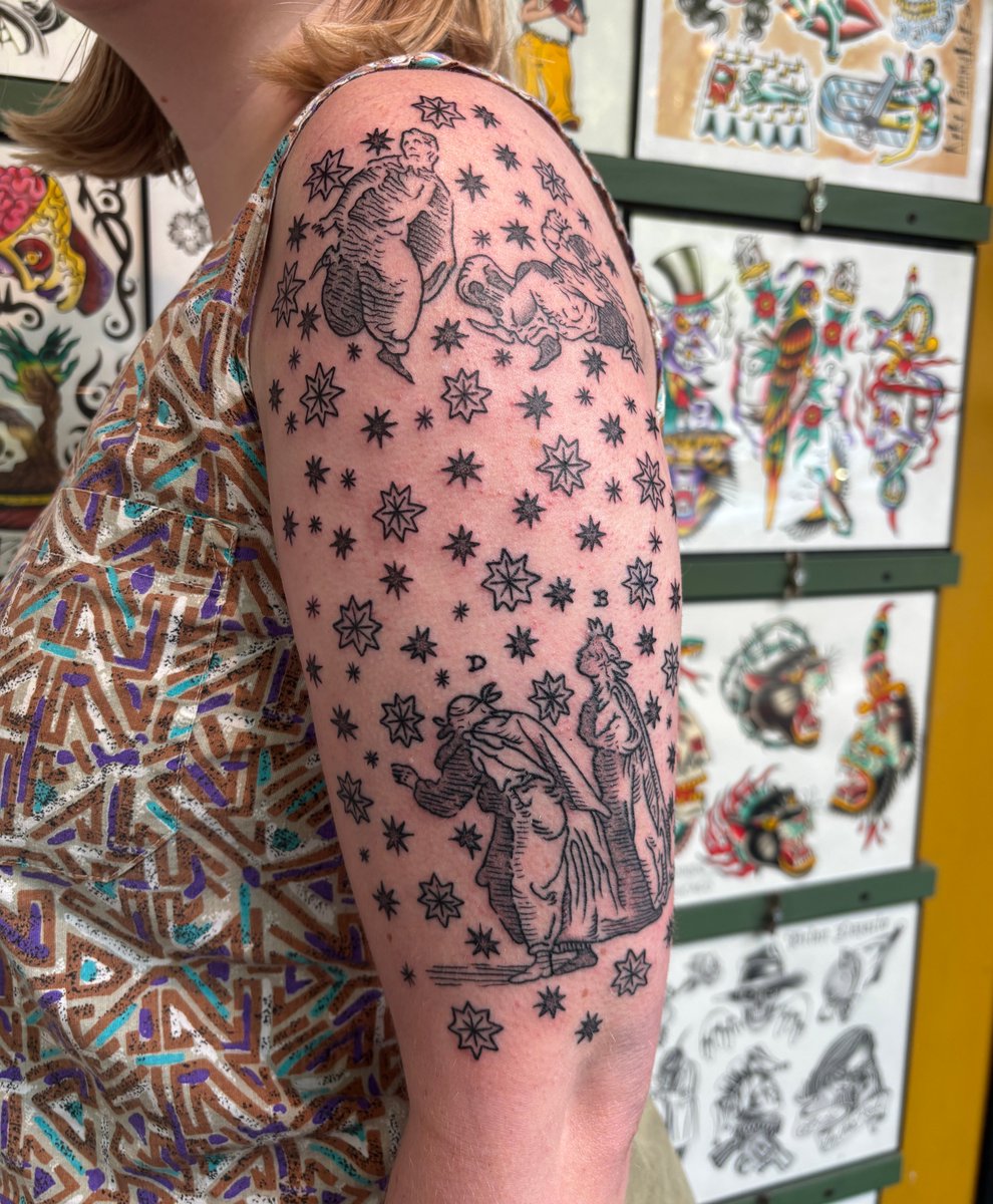 mcmansionhell's tweet photo. my half sleeve of dante and beatrice among the stars https://t.co/enTQ0ZUDmH