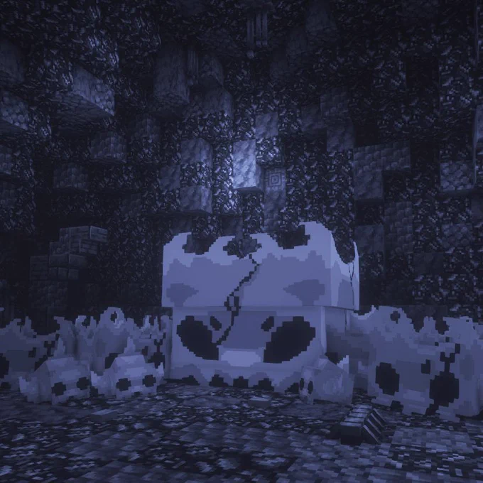 A Minecraft scene showing a dark cave with bugs and skulls on the floor.