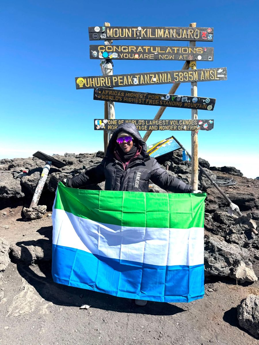 salonedrips's tweet photo. Sierra Leonean global OB-GYN Fatu Forna climbs Mount Kilimanjaro in Tanzania, the highest free-standing mountain in the world and holds up the Green, White and Blue flag. 🇸🇱 Proud Sierra Leonean! ❤️🇸🇱 https://t.co/9SrD5giATK