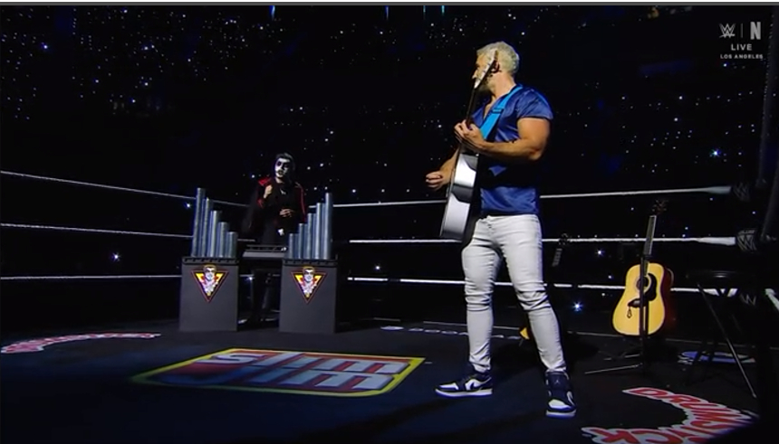 mooncupcake63's tweet photo. Very cursed concert #WWERaw https://t.co/JsGpnvl5f9