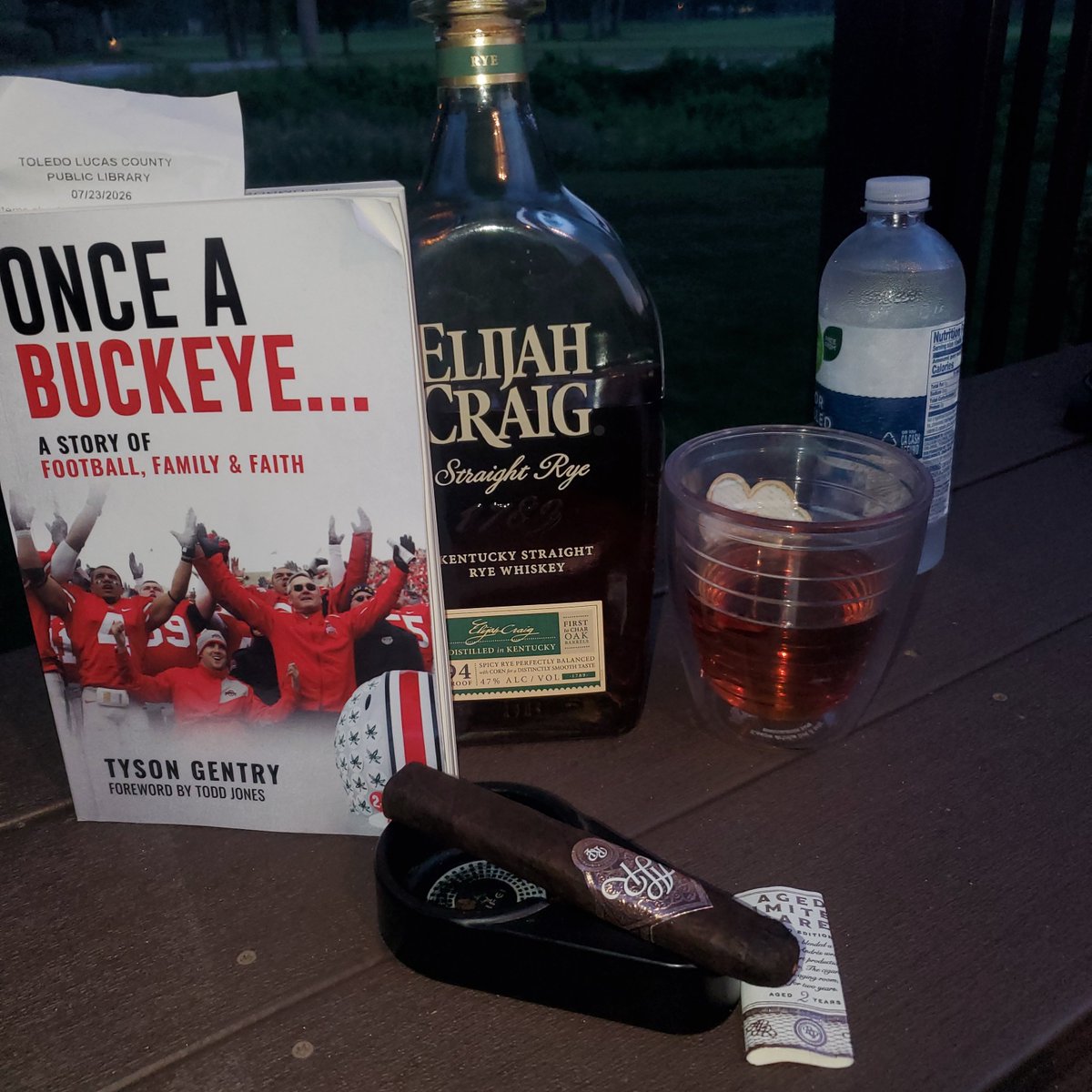 BTehanOSU's tweet photo. "Once A Buckeye" by Tyson Gentry with some Elijah Craig Straight Rye and a tasty Rocky Patel 😋 #tysongentry #OnceABuckeye" @Elijah_Craig @RockyPatelCigar @RockyPatelDR #giddyup #2COTD https://t.co/xP9p3yQkuA