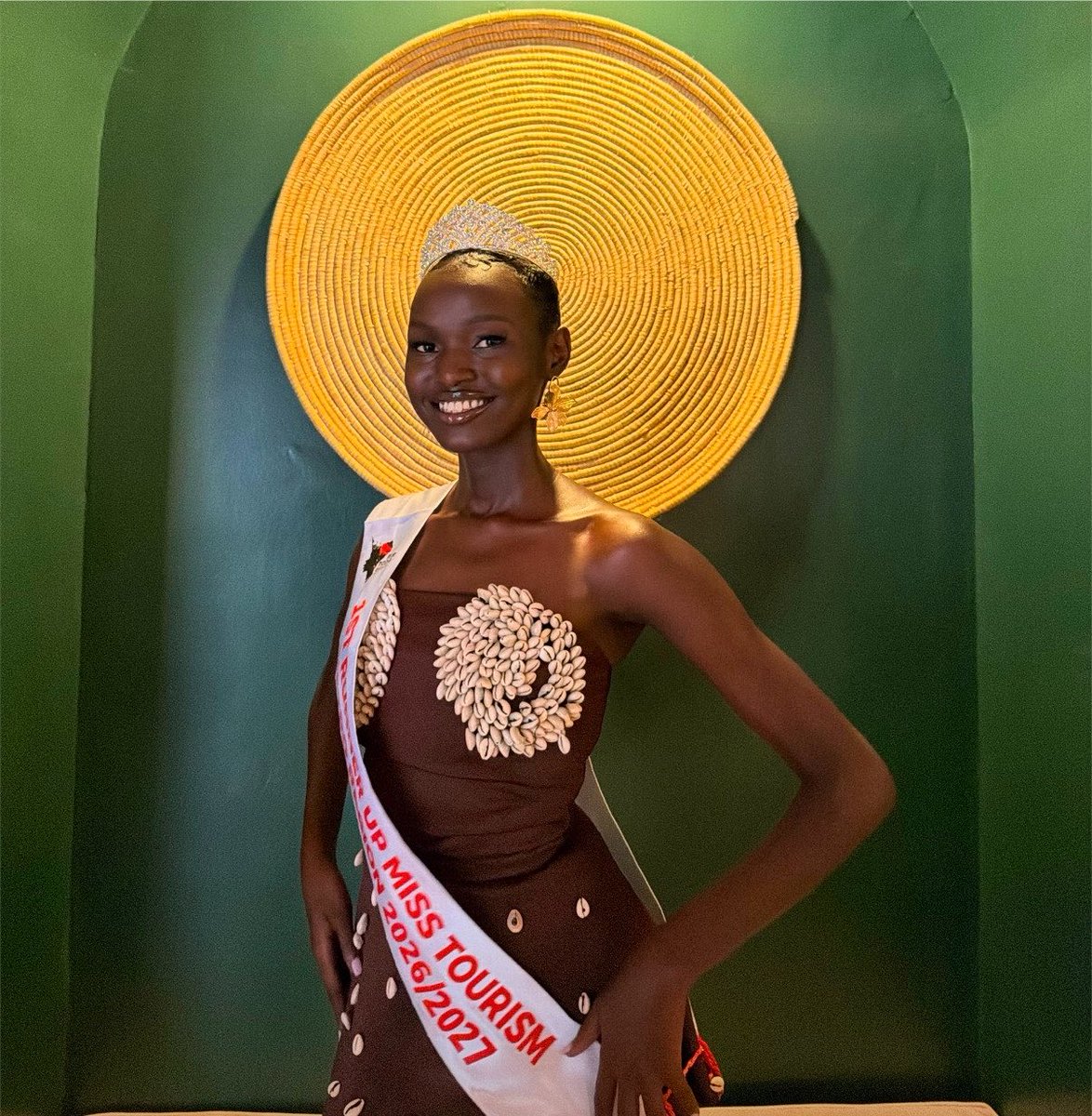Zakstyless's tweet photo. This is brown earth from the Pearl of Africa. Cowrie shells, once used as currency, now worn as crown. 

This is heritage you can wear. Adorned with cowries, like stories passed down and This is how we do royalty in the Pearl of Africa. 

Wear #Zakstyles https://t.co/oJz4gF8dWl