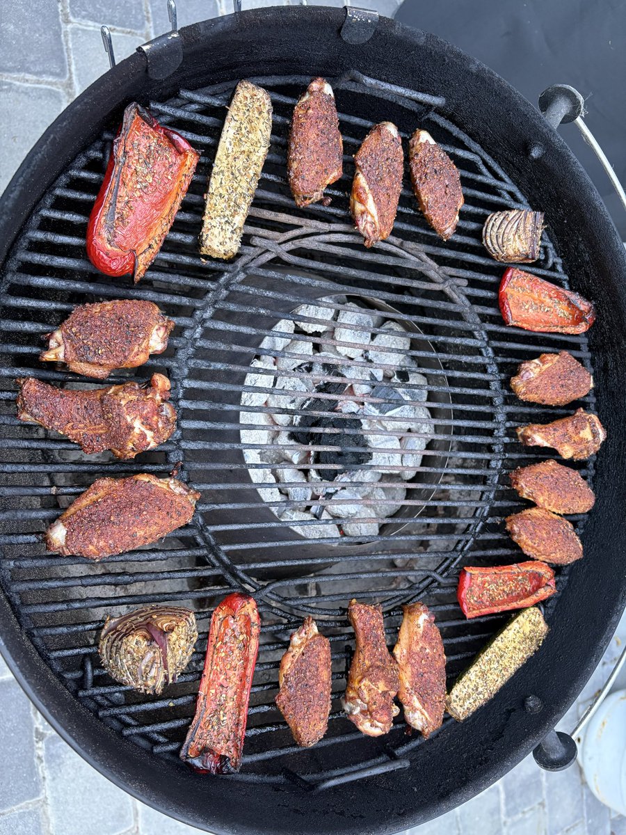 JawaadMitchell's tweet photo. Grilled wings and veggies over coal and apple chunks. @EnakFlavors Cajun Heat and @DadsSeasonings Pepper Blend on the wings and @FireHatchRubs Survivor on the veggies https://t.co/6xpnBKjy5e
