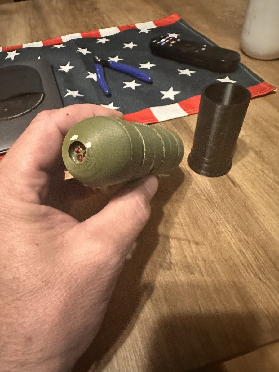 mackaymeadows's tweet photo. Color recognition M203 flare? Sensors pickup orange clay target and engage it. Fun range day concept?
This is prototype, final tube would be solid. In section now for efficiency in developing. 
Fighting latency/noise right now. It's getting better though. 
I setup LED’s to sim engine adjust toward target. So far so good, she's tracking the clay target. Utilizing better photo resistors woildnof course be better. 
But this project is basically being made off of things laying around. LED’s can be used as photo receptors. Different color LEDs for spectrums to setup certain targets. 

Can also have uses of launching down a street and utilize a lsm sensor for VOC volatile compounds. Can possibly mark danger zones. Can be packed with orange powder to smack down and give heads up on explosive or chemical detection areas. 
Many uses.