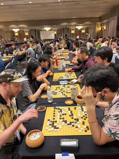 theaga's tweet photo. ⚡ 114 players battled in Monday night's Lightning Tournament! Five finished 5–0, and the table winners now advance to the playoffs to decide the Dan and Kyu champions. #GoCongress #Baduk https://t.co/WMQfViRHWN