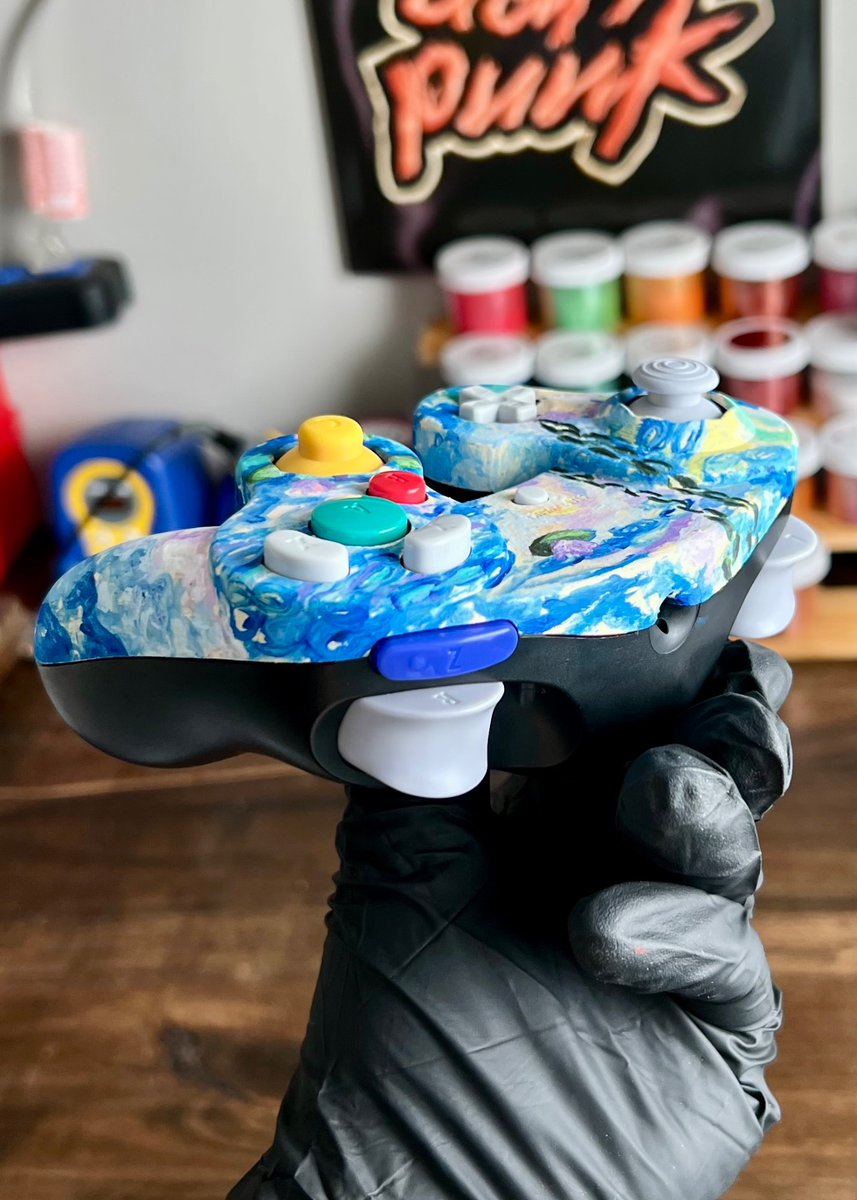 DaFunkGaming's tweet photo. Water Lilies on GameCube Controller 🪷🪻 

Painted by the amazing Fleytutart ✨ on Instagram

Available on my shop https://t.co/Dus5dtejPB