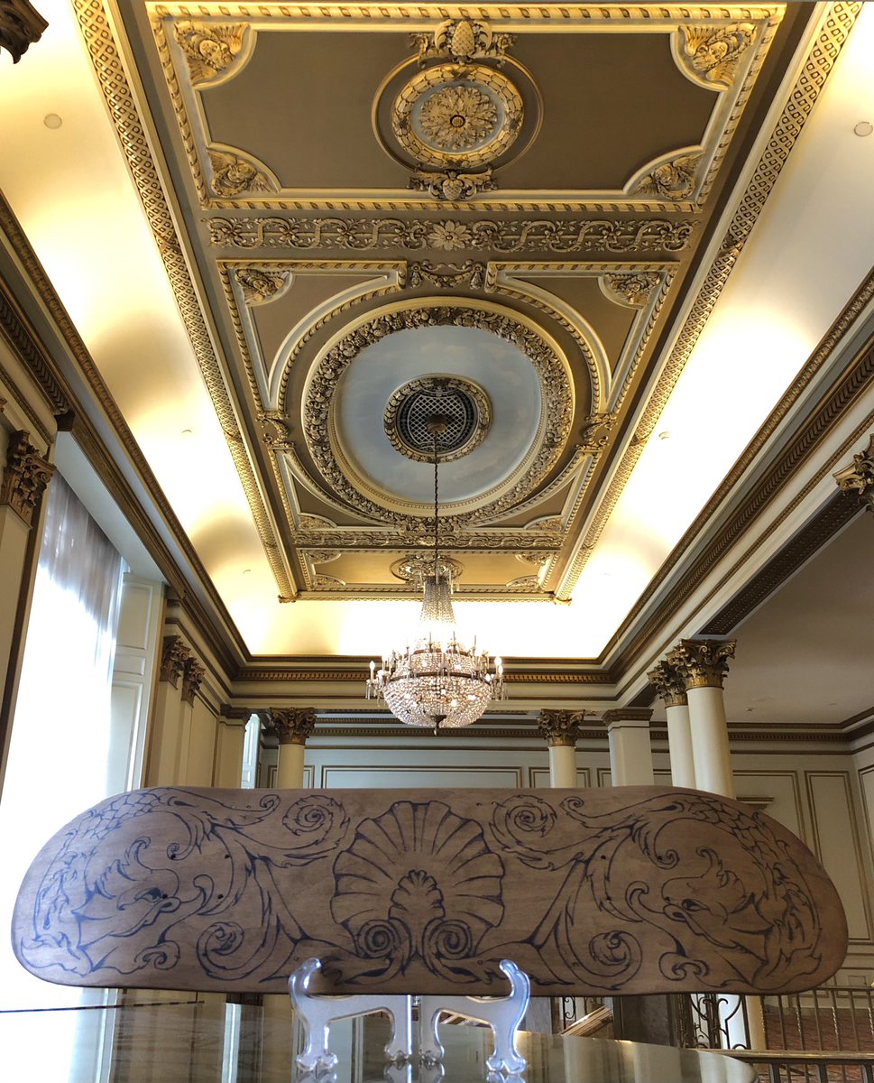 DOC604's tweet photo. My new @FairmontVan #SkateBoard next to the original #blueprints on display in the basement &amp; in the grand hall upstairs as well as from the @VanArtGallery across the street! #davidcapperartwork #skatedeck https://t.co/lzajHaafRW