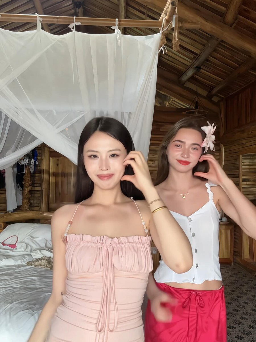 LunarTally's tweet photo. Staying in a wooden cabin with my bestie, she's in pink and I'm in white. Soft curtains, warm wood, everything just feels so cozy. No plans, just chatting and doing nothing together. These little moments hit different 🩷🤍 https://t.co/4AgPXjGb1c