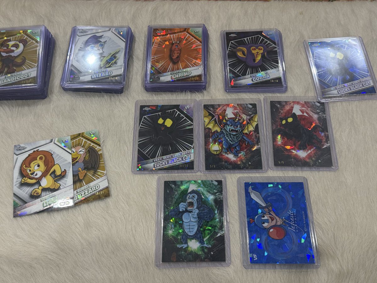 scubapro2020's tweet photo. Opened a personal case of Sapphire and hit the Jackpot!!!! 5/5 Hidden Gems Black Cat, 5/5 Hidden Gems Harpik, Base Hidden Gems Gorilla, infinite Kind Warrior, 10/10 Black Cat and 10/10 Cobra https://t.co/6PGELABPhd