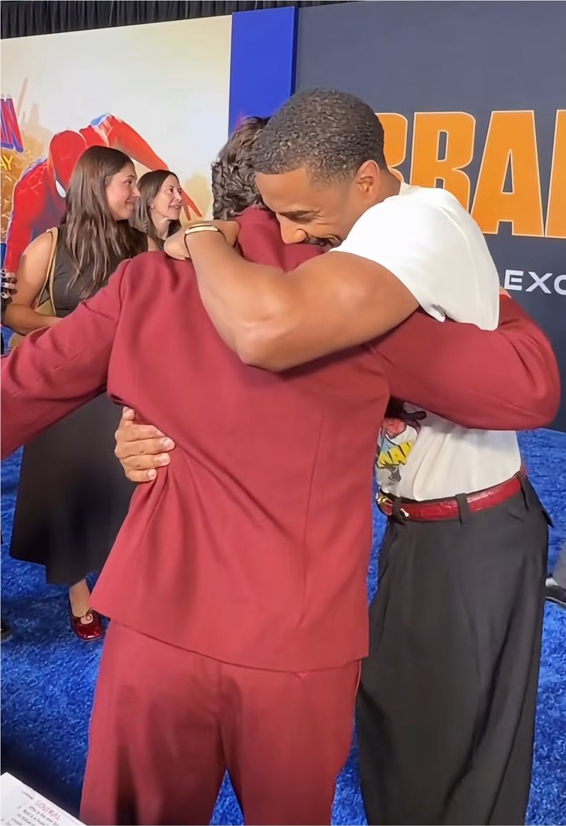 FilmUpdates's tweet photo. Tom Holland and Michael B. Jordan hug at the ‘SPIDER-MAN: BRAND NEW DAY’ premiere. https://t.co/HmXJ5MvoOI