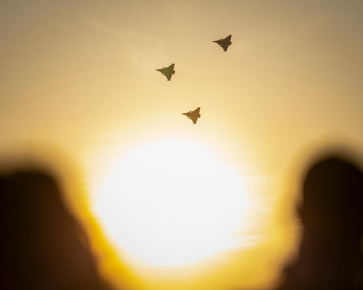 IAF_MCC's tweet photo. The Indian Air Force contingent is actively engaged in #ExercisePitchBlack 2026 alongside the Royal Australian Air Force and Air Forces from 20 nations.

A spectacular Rafale flypast over Darwin's iconic Mindil Beach marked the opening of the exercise. The IAF contingent also clinched Gold in the multinational football tournament.

Training Together.
Integrating Seamlessly.
Flying Stronger.

#IndianAirForce #Rafale #RAAF #AirPower #Interoperability

@DefenceMinIndia
@SpokespersonMoD
@HQ_IDS_India
@adgpi
@indiannavy
@CareerinIAF
@cgisydney
@AusAirForce