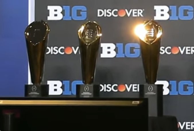 CFBTalkDaily's tweet photo. The Big ten displaying the last 3 national championship trophy’s at media day

Ultimate flex https://t.co/hSihgqcruq