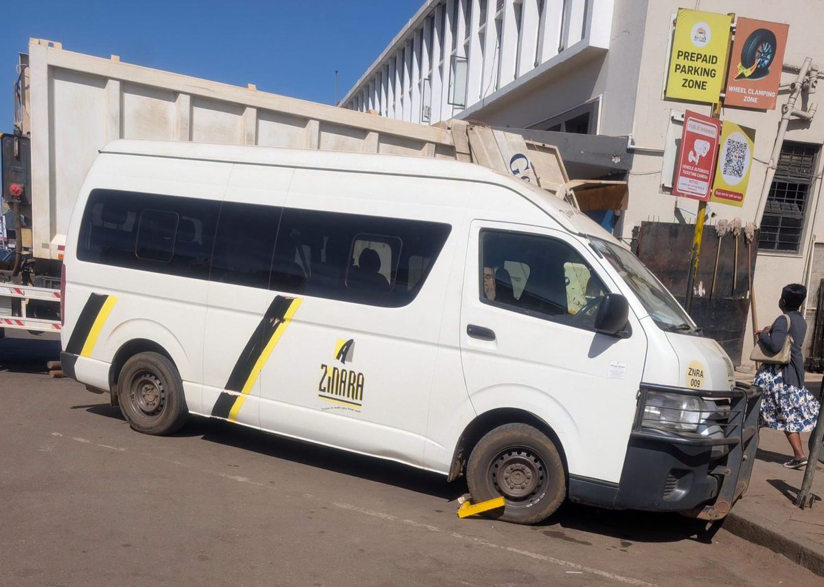 CrimeWatchZW's tweet photo. A hilarious image shows a ZINARA kombi that was clamped by City Parking for failing to pay for parking. https://t.co/86gSNaNC2w