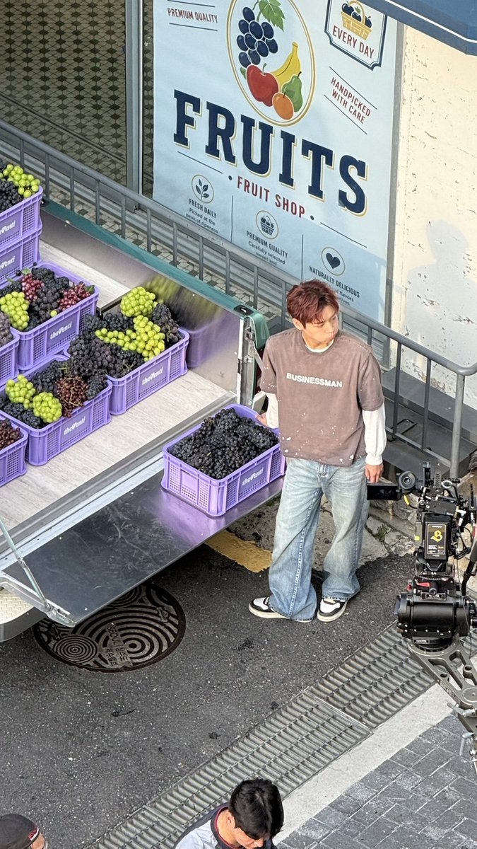 orbtingyou's tweet photo. so jihoon filmed the venti coffee ad with his cherry red hair 🥴 https://t.co/9nPxRCevDr