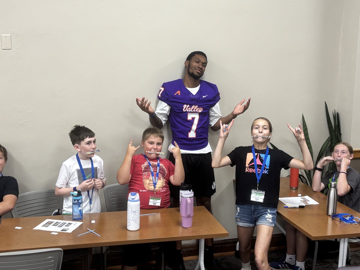 MovalFootball's tweet photo. Love seeing our guys take time with some of our local youth this week. STEAM camp right here on our campus here at Missouri Valley College as well as our guys working with our youth at the Powerhouse Youth Camp. It’s always a great day to be a Viking! #ValleyWillRoll 🟣🟠 https://t.co/KLOntu5vGR