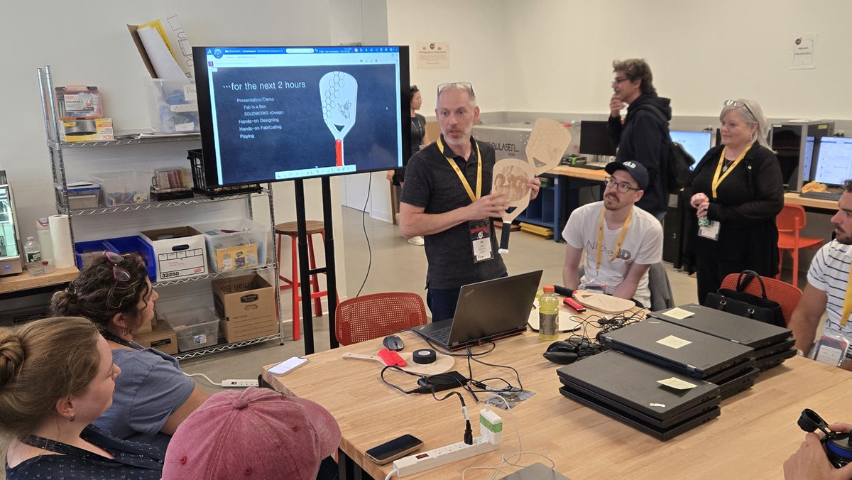 BrandonPrentice's tweet photo. Learning about embroidery machines, using Solidworks software to fabricate a pickleball paddle, & 3D printing candy in today's hands-on workshops! #FAB26 #FabLab #3dPrinting #Solidworks @dr_zebrasky https://t.co/AwmKtv7D3L