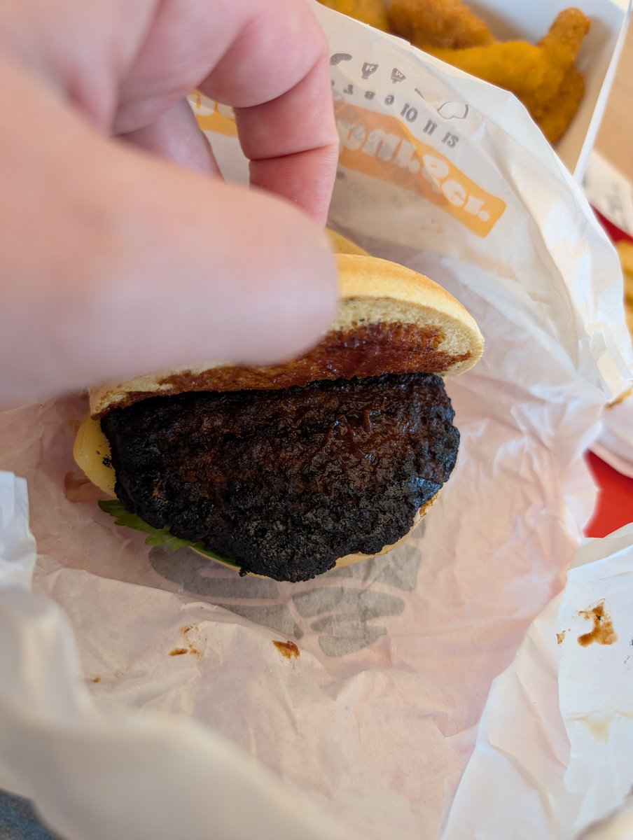Charlie_Ventz's tweet photo. @BurgerKingUK 
Not impressed.
Nasty crunch of charcoal when I bit into the alleged BBQ Angus beef &amp; vile taste.
Definitely a kids burger they gave me and not a proper BBQ Angus. The taste of charcoal was vile.
Never again.
Missing items, cremated food, absolutely abysmal. https://t.co/4MibmGRHA1