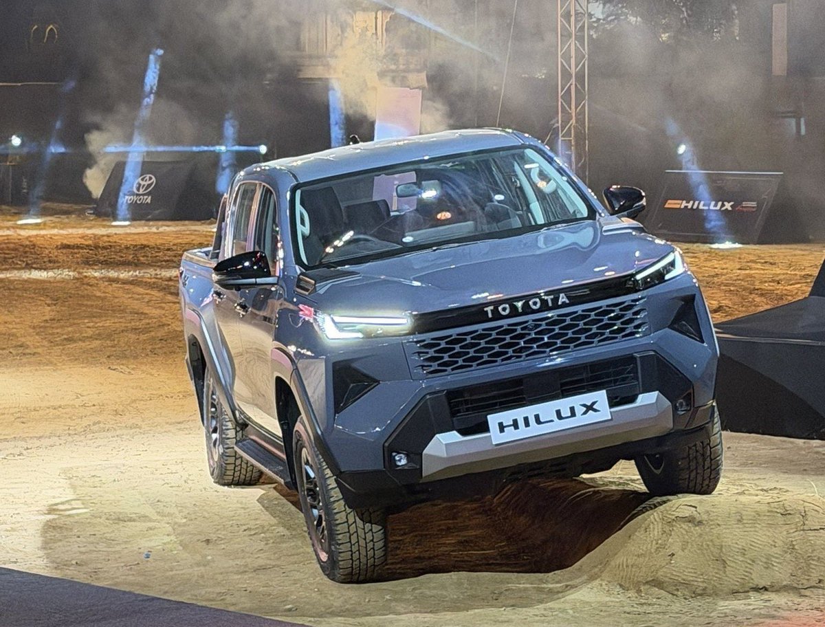 PulseParallax's tweet photo. Toyota just launched the new Hilux starting at ₹31.99 lakh. If you look around, the obsession with massive pickup trucks in Indian cities has reached a wild new level. We are buying heavy utility equipment and calling it a premium lifestyle choice.

The new base GX 4x2 AT for ₹31.99 lakh and the top-end VX 4x4 AT for ₹36.69 lakh. They sell you the rugged dream of off-roading in the mountains. The actual reality? Almost all of these trucks will never see a dirt road. They will just be used to aggressively flash high beams at small hatchbacks in evening traffic.