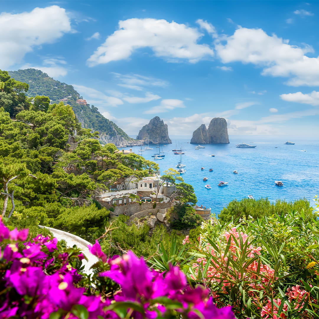JMCvacations's tweet photo. Capri, Italy, makes you forget the rest of the world exists! Cruise past the towering Faraglioni sea stacks, glide into the mystical Blue Grotto, and summit Monte Solaro for sweeping views. Book your bucket-list trip! (781) 326-2058 https://t.co/eXR3b24ITR