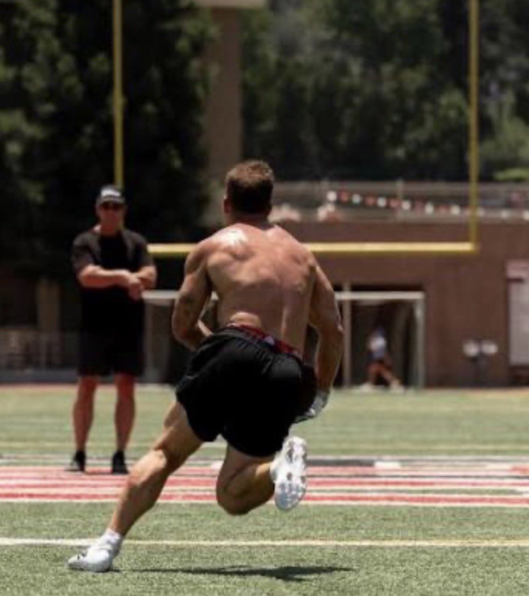 Tripp_untamed's tweet photo. This post went viral and has been very controversial, so I need everyone to help me get something straight:

Christian Mccaffrey, freak athlete, all pro, future hall of fame, is switching things up. Why? Because he’s looking for an answer to a problem. If there were no problem, he’d be doing exactly what he’s always done. That problem is injuries. He wants longevity. You can ask the basic free version of chat GPT who the most injury prone back in the NFL is, and it will tell you Christian, evident below. Does that mean he is not a premier back? No. Does that mean he has an injury issue he wants to get fixed? Absolutely

Does work load play a role? Absolutely. But that doesn’t change the fact that there is an injury prone issue. He’s missed 27% of his games, he’d tell you himself he’d like to fix that figure. For the performance world to just shrug their shoulders and say “well, work load high injuries happen” is sloppy and irresponsible. Considering there are many backs with similar work loads and not a fraction of the injury issues. I’d bet the house Christian would agree, look at what he’s doing 

I point out that in every single cut jump and juke his ankles collapse and his knee caves in. I point out there is a much healthier loading pattern option if you value durability. This picture of him below wasn’t even hard to find. This was his recent freaking post. It took five seconds to find. Instagram page, Find a full body movement, there’s the ankle and knee collapse 

In thousands of hours of analyzing non contact video of injuries, the vast VAST majority of the time you find an ankle collapse inward absorption injury mechanism. You are very VERY hard pressed to find a non contact injury with a maintained ankle structure where the inner ankle bone climbs and the knee opens up to receive pressure. I’ve attached a video with the exact same cut, one resulting in an injury, one not. One is the famous ACL tear form the college national championship. Which one resembles CMC’s loading pattern more?

Mccaffrey doesn’t need more speed or power. He’s one of the fastest and most explosive backs in the league. He wants less injury. That’s why he’s working with Ido. 

But IM THE CRAZY ONE, for questioning the fact that the Israeli Jew former IDF circus acrobat has Christian meditating and reading advanced literary pieces in an attempt to stop the nagging Achilles and calf issues, when he has a glaring repeating pattern of ankle and knee collapse. No one bats an eye when this dude suggests reading the fucking Iliad and the Odyssey is the solution? 

Are you fucking kidding me sports performance X? I’m the crazy schizo idiot? Really?