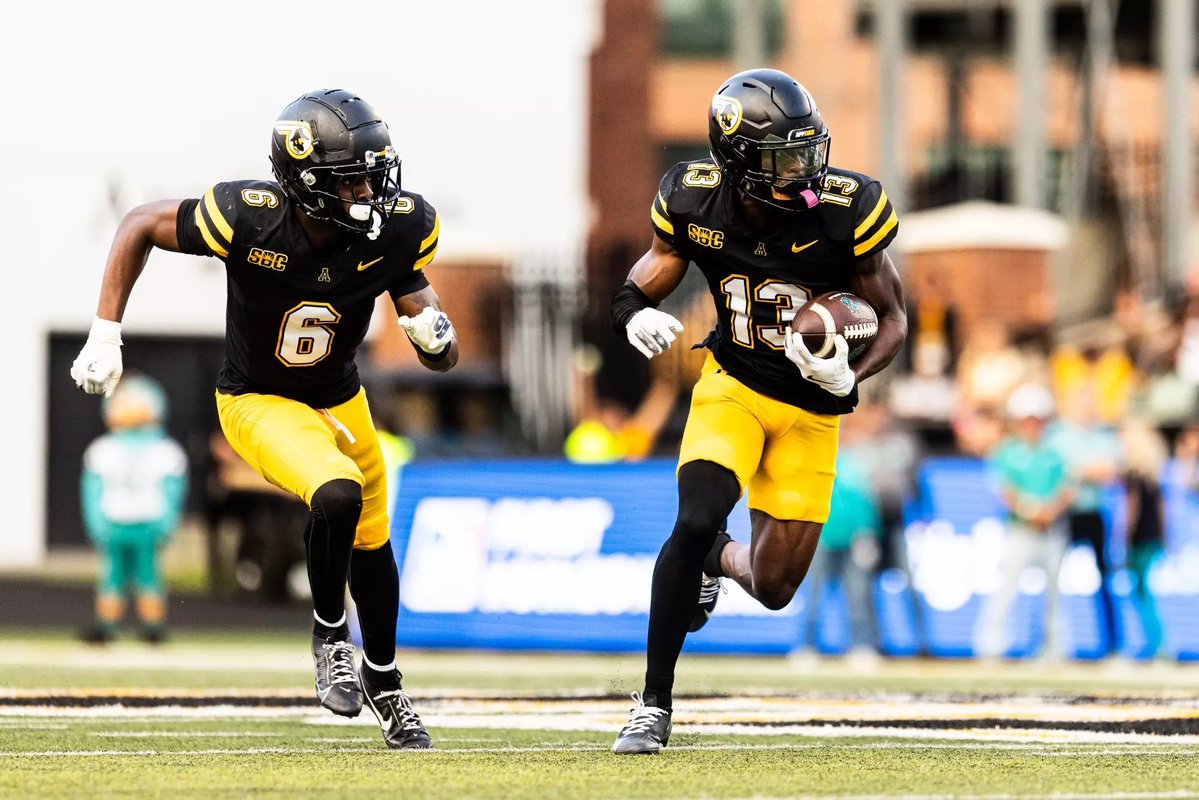 TreiyCrenshaw6's tweet photo. After a great conversation with @Justin_Harpo, I’m blessed to receive my 10th D1 Offer from Appalachian State University! 🖤💛  @ChadSimmons_ @ALLGASATHLETES @CoachTyBrooks @SouthWaltonFB @FLPrepVarsity @ScoutFball @adamgorney @PhilTisa @NP_Florida @ZBlostein247 @PrepRedzoneFL https://t.co/CajBUui9Ex