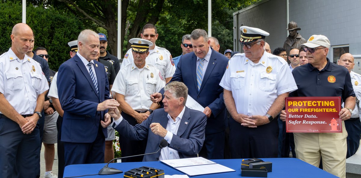 RISenate's tweet photo. Sen. John Burke and Rep. Earl A. Read III joined Gov. Dan McKee today at West Warwick Fire Station 4 as the governor ceremonially signed a law that creates a database for electric cars to aid in firefighting efforts.

Learn more: https://t.co/6q8TvWdEfL https://t.co/DP7nWUeF6I