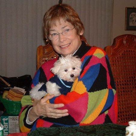 SaraCatholic's tweet photo. This is the last pic I have of my mom. Christmas 2008. She had given me this puppy earlier that month as a Christmas gift. Little Theo passed this year and I miss him daily. (I miss her too btw.) So this pic is so dear to me. Pain is definitely the price we pay for having loved deeply.