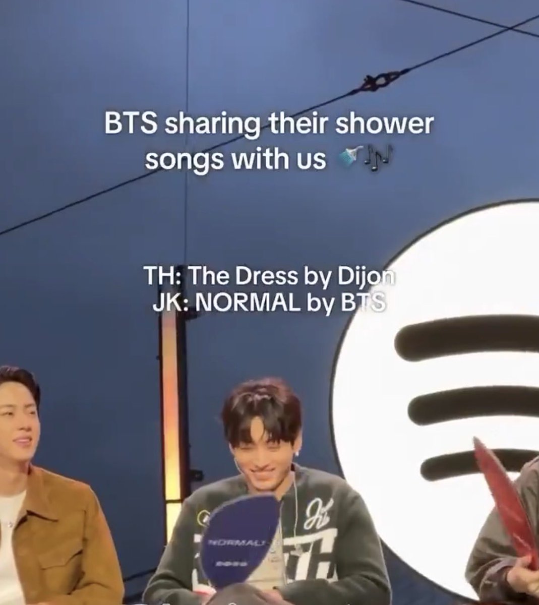 cypherpt1s's tweet photo. just remembered jk picked ‘normal’ as his shower song at the spotify event back in march. the mv was filmed in feb. look at his face! he thinks he’s so funny! 🤣 it just took us 4 months to get the joke https://t.co/sL9YCuRAaP