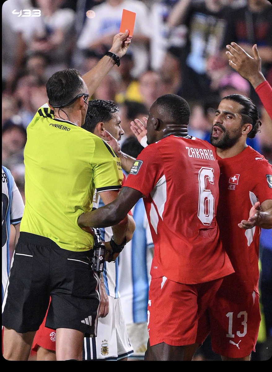 Grandsoncr7's tweet photo. 🗣️Granit Xhaka:

“The IFAB coming out now to announce that the referee made a mistake by giving Blee Emboli a red card just shows that this 2026 World Cup was planned for Argentina to win. When the incident happened on the pitch, I demanded a proper review of the action, but the referee never listened. 

He paid more attention to Lionel Messi telling him that it was a dive and that Emboli deserved a second yellow card.
The referee wanted Argentina to beat us so badly, and even VAR never listened to our complaints. 

It was at that moment I realized that we weren’t playing against a team, but against the whole organization. They robbed us and denied us a chance to go further in the World Cup.
I’m glad the truth is gradually coming out, and it is exposing Argentina in the process.”