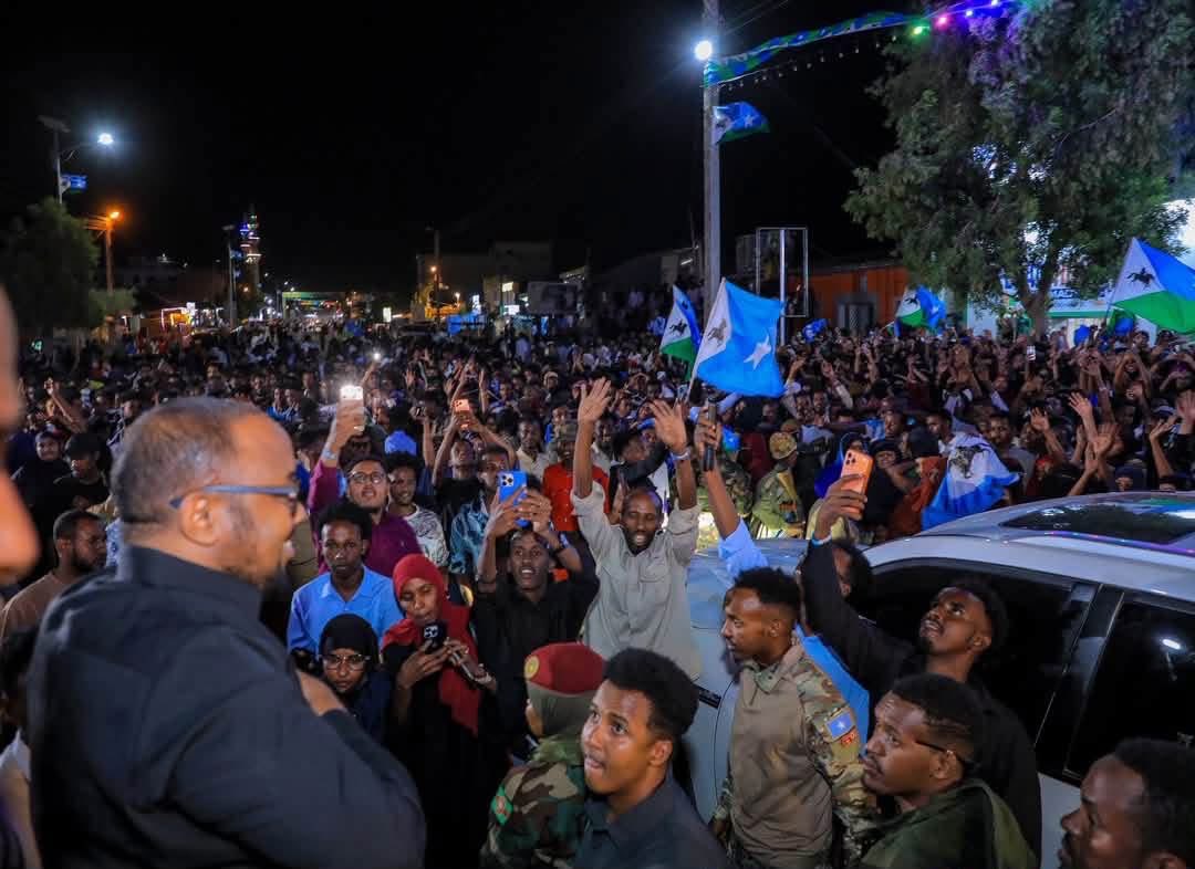 dervish1920's tweet photo. Tonight, we celebrated #Taalada #Shuhadada as part of the lead-up to #30July, the anniversary marking the founding of the #Northeast State, and it was attended by our President, H. E Abdikadir #Firdhiye, together with members of the public, in a spirit of unity and remembrance. https://t.co/DFqk2SIF8v