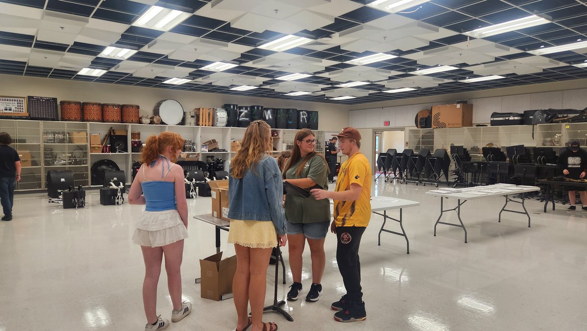 BCHS_Mr_J's tweet photo. Specail thanks to these helping hands that came to prepare music folders, t-shirts, flip folders, lyres, sousaphones, drumline equipment and more! We are almost ready to fire up the big red machine! https://t.co/UAr4796lWF
