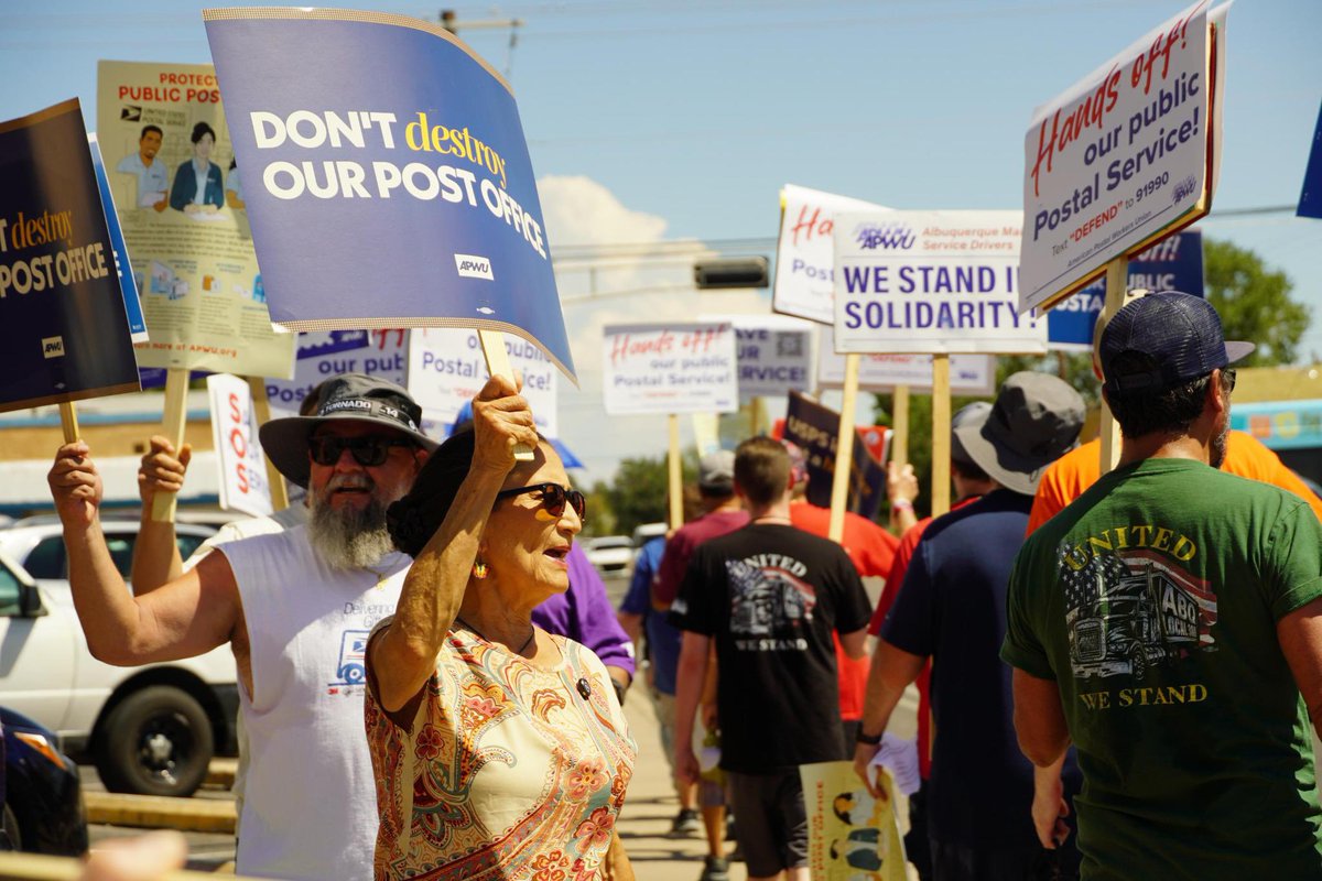 DebHaalandNM's tweet photo. The Postal Service is a lifeline for New Mexico. It connects rural communities, delivers lifesaving medications, supports small businesses, and ensures every family can stay connected no matter where they live.

That's why I was proud to stand with postal workers today. They deserve leaders who will protect good union jobs and defend the public services New Mexicans rely on, not politicians or billionaires who want to weaken or privatize them.